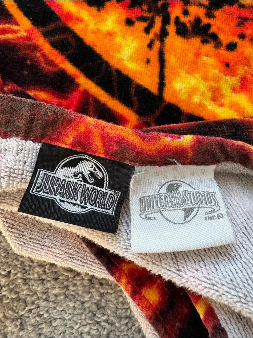 Jurassic Park T-Rex Lava Print Beach Towel - Black & Fiery Orange